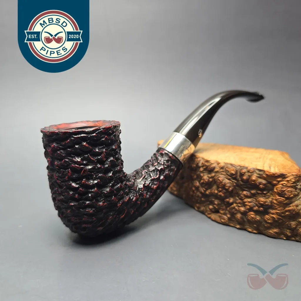 Peterson (1993) Sherlock Holmes Rathbone Rusticated Bent Billiard with Silver (Estate)
