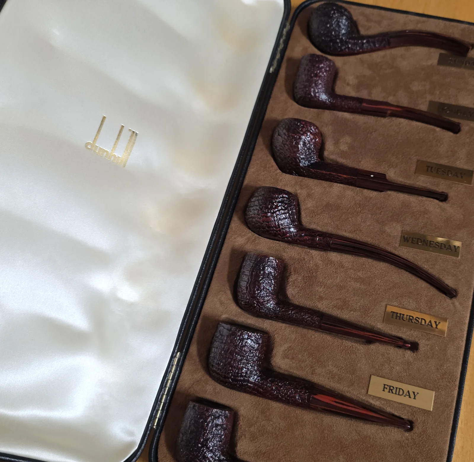 Rusticated pipes in a fitted Dunhill presentation case with day-of-the-week labels